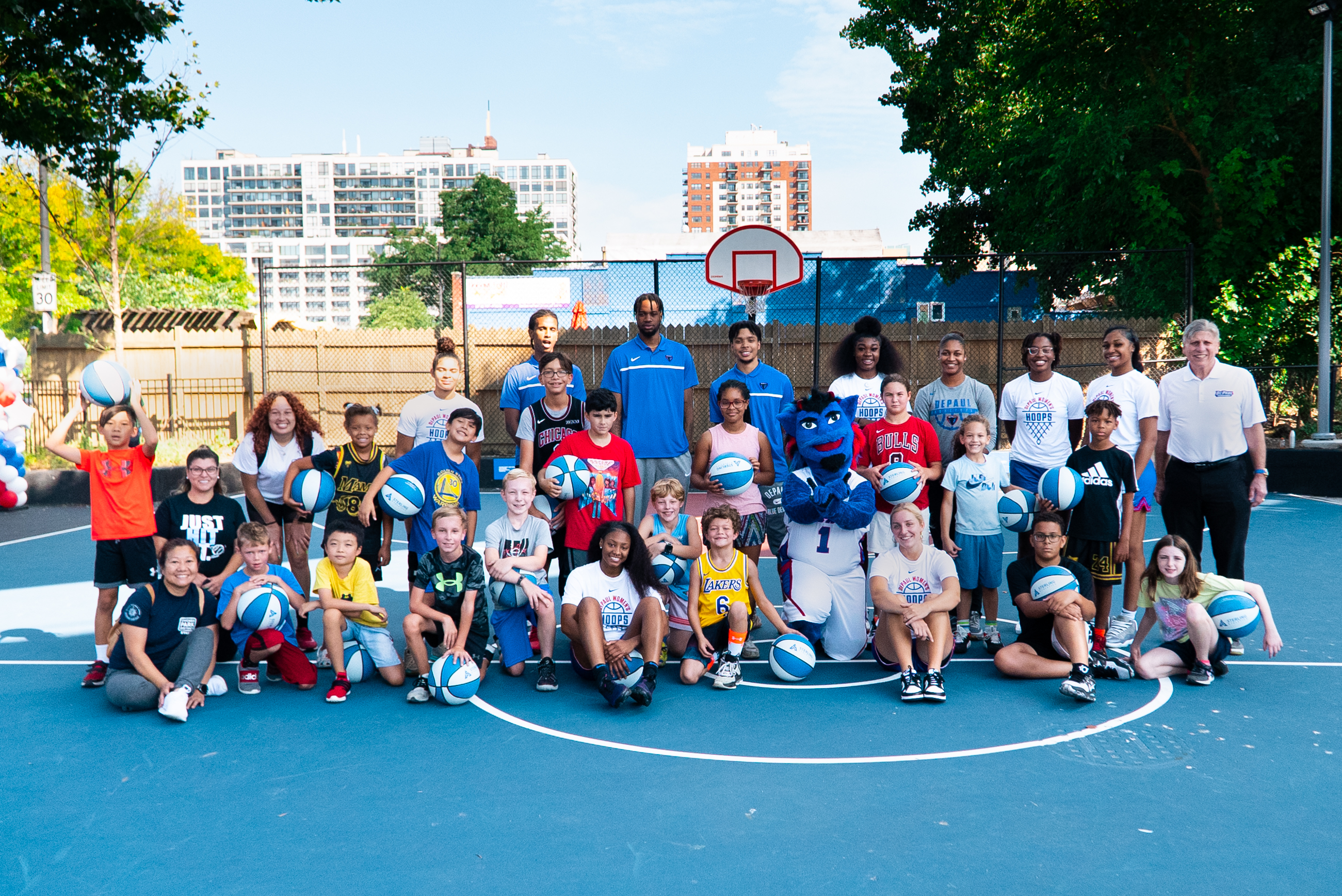 Blue Demons and Chicago community members gathered on a sunny Saturday to celebrate the renovation of the city's Margaret Hie Ding Lin Park, located at 1735 S. State St. (Image courtesy of Kassidy Brown)